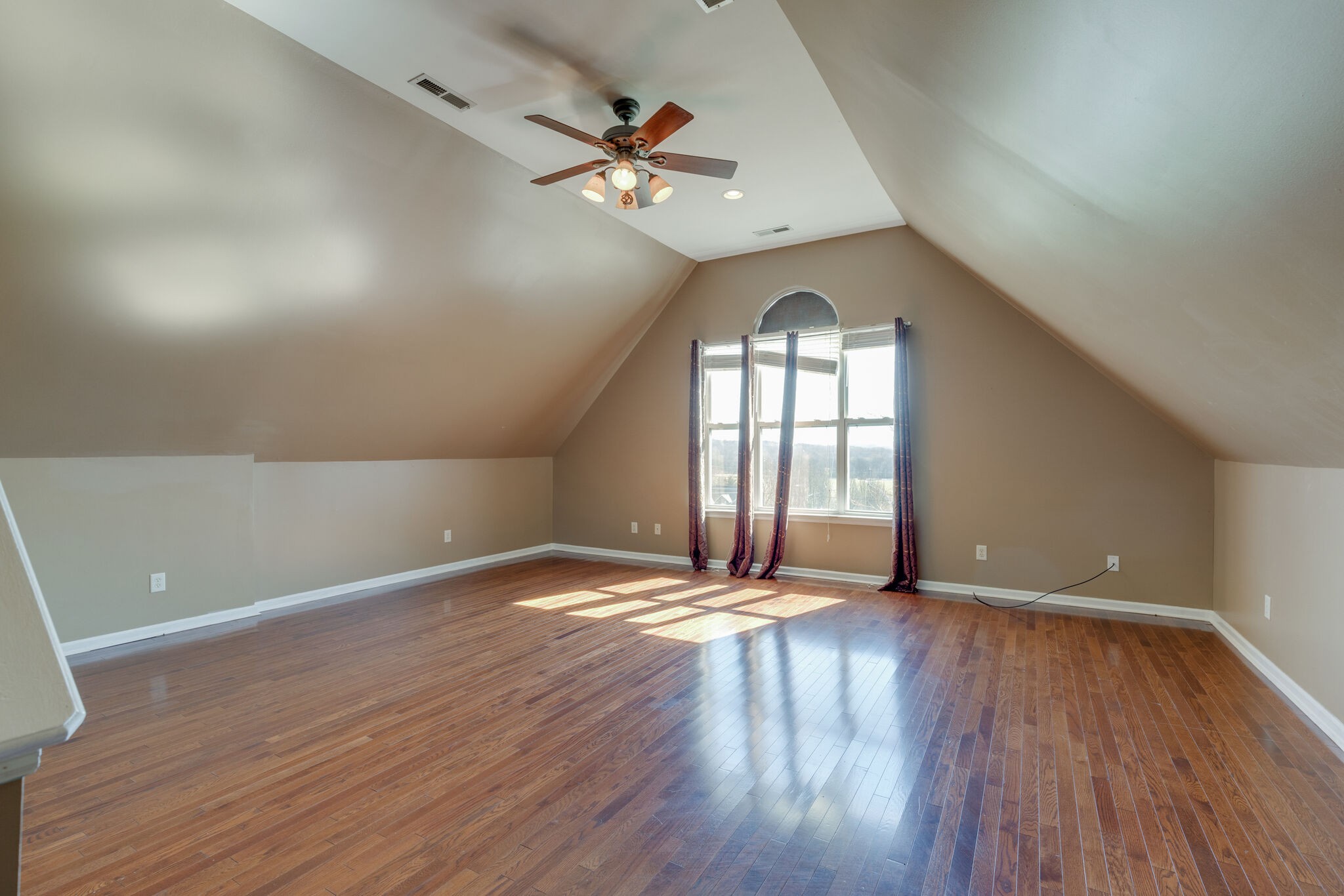 2017 Viewpointe Way Columbia, TN 38401 - Photo 17 of 24 wooden floor in an empty room with a window