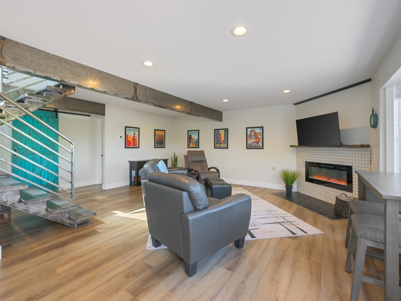 383 Explorer Court, Unit B Grand Junction, CO 81507 - Photo 6 of 40 a living room with fireplace furniture and a flat screen tv