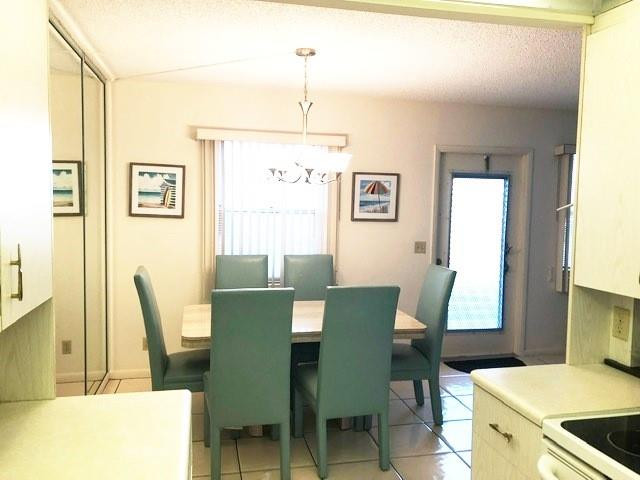 1057 Exeter, Unit 1057 Boca Raton, FL 33434 - Photo 14 of 64 Open kitchen to dining area