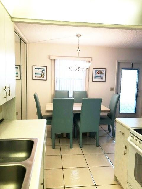 1057 Exeter, Unit 1057 Boca Raton, FL 33434 - Photo 19 of 64 Open kitchen to dining area
