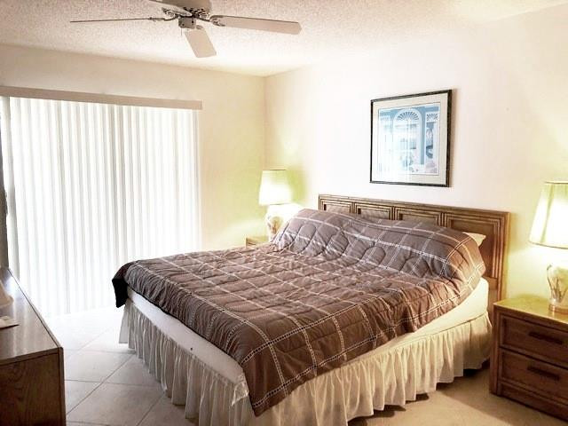 1057 Exeter, Unit 1057 Boca Raton, FL 33434 - Photo 23 of 64 Largest bedroom with slider out to patio