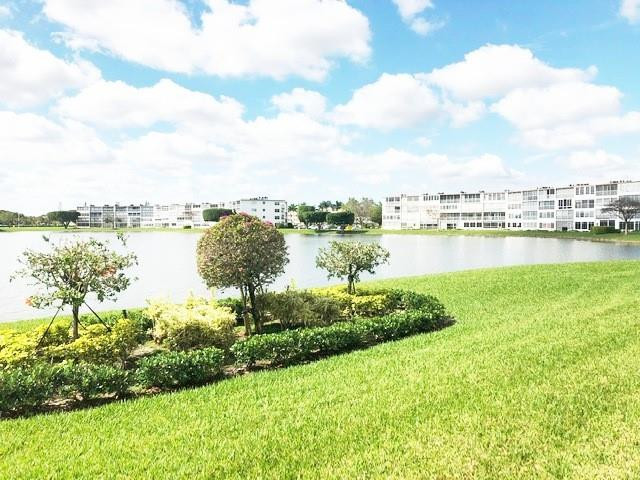 1057 Exeter, Unit 1057 Boca Raton, FL 33434 - Photo 50 of 64 Panoramic backyard lake views