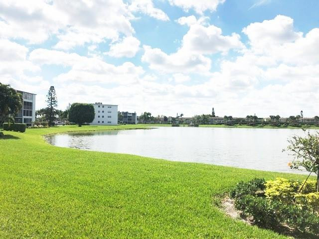 1057 Exeter, Unit 1057 Boca Raton, FL 33434 - Photo 51 of 64 Panoramic backyard lake views