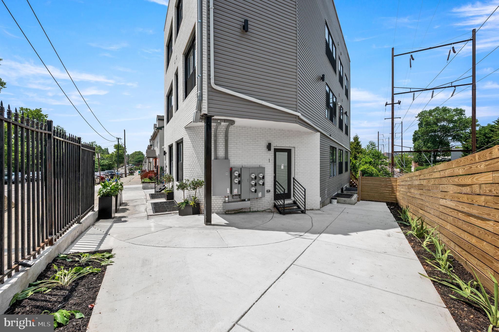 4921 Chester Avenue, Unit 2O2 Philadelphia, PA 19143 - Photo 10 of 10 a view of a chairs and tables in the patio