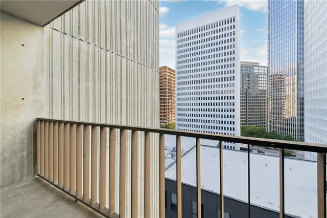 a view of a balcony with a street
