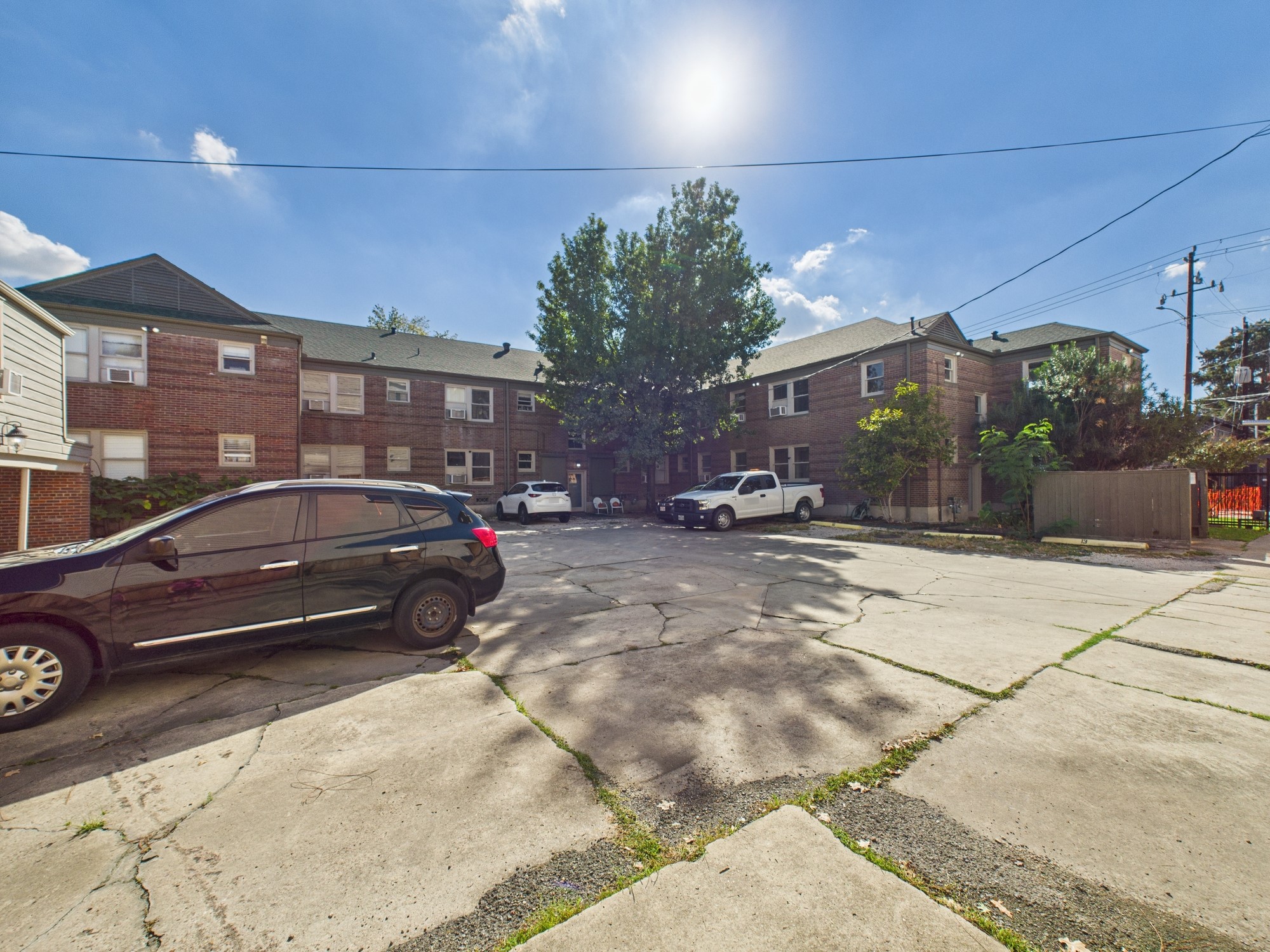 1920 Richmond Avenue, Unit 17 Houston, TX 77098 - Photo 10 of 17 a view of street with parked cars