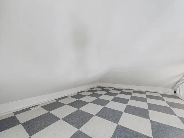 a black and white checkered floor with a black white checkered floor