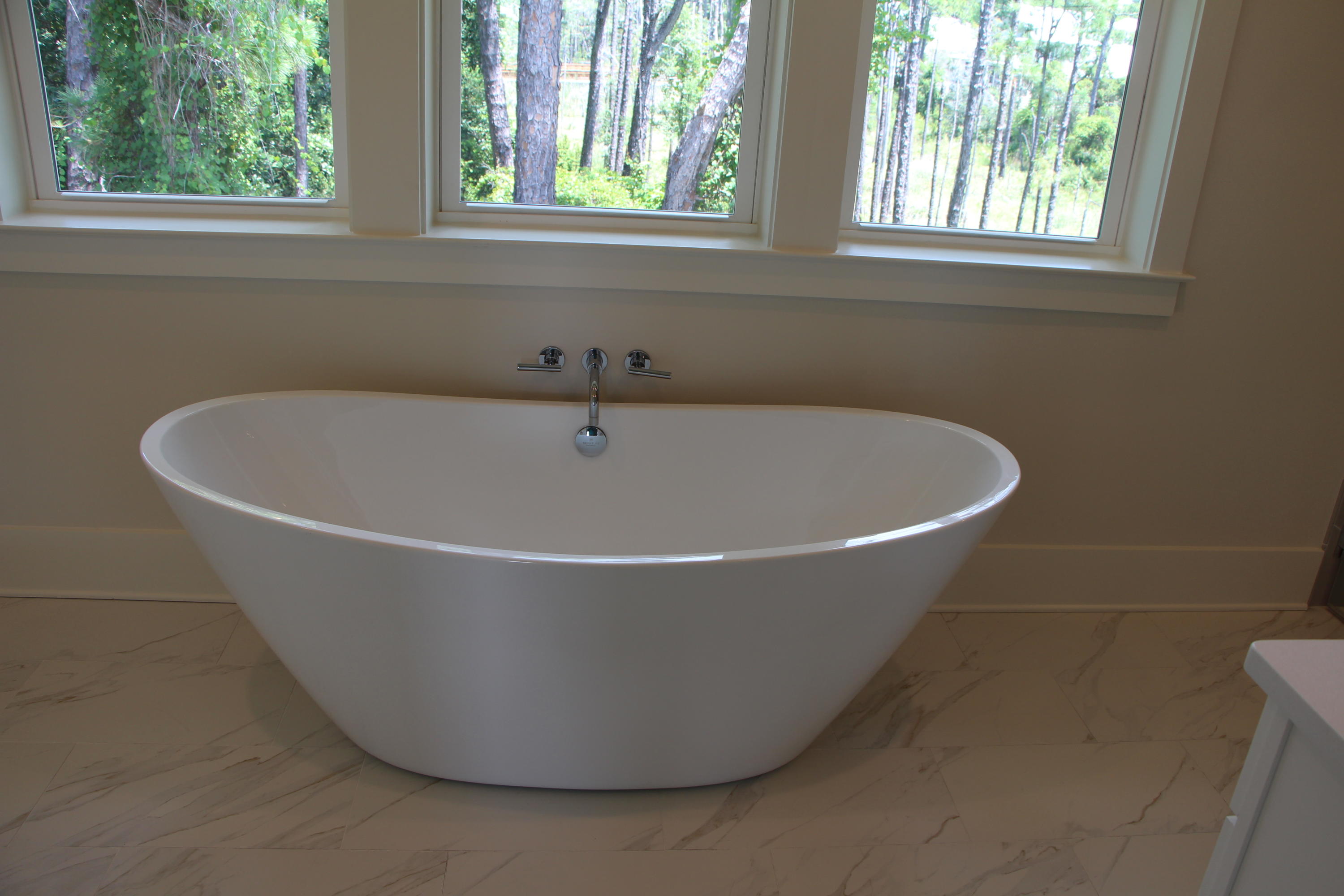 302 Cabana Trail Santa Rosa Beach, FL 32459 - Photo 7 of 8 a white bath tub sitting in a bathroom