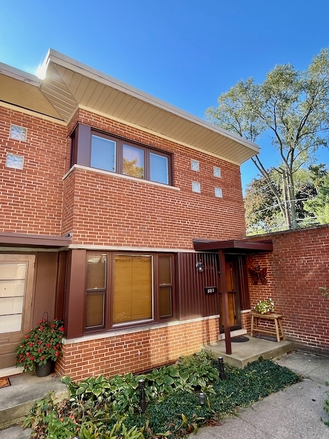 511 1/2 1/2 Ridge Road Wilmette, IL 60091 - Photo 1 of 20 a front view of a house
