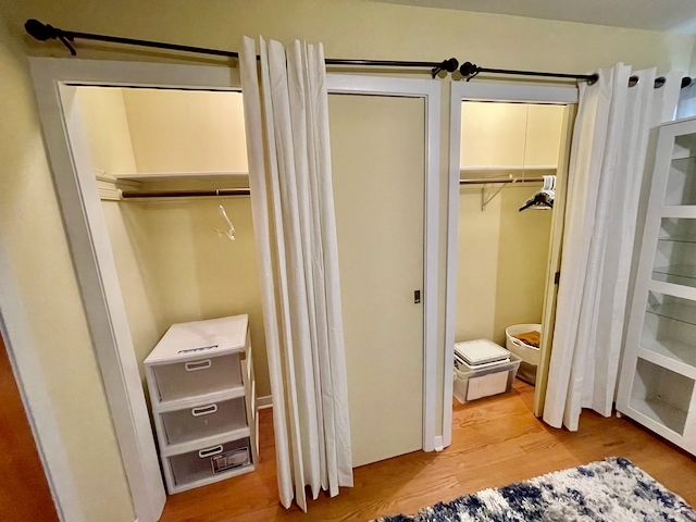 511 1/2 1/2 Ridge Road Wilmette, IL 60091 - Photo 11 of 20 a bathroom with a shower and a toilet
