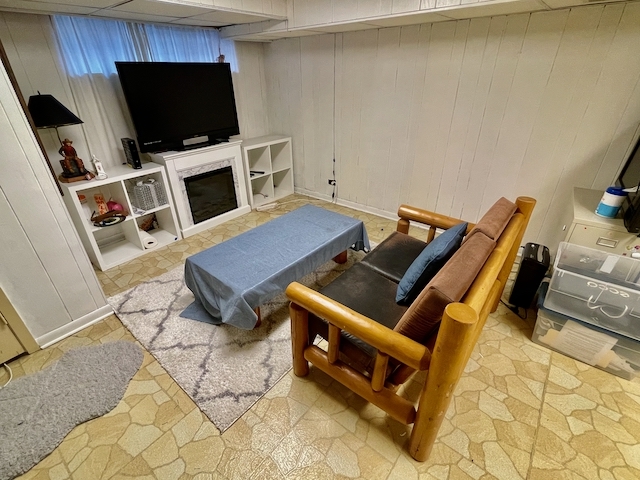 511 1/2 1/2 Ridge Road Wilmette, IL 60091 - Photo 14 of 20 a living room with furniture and a flat screen tv