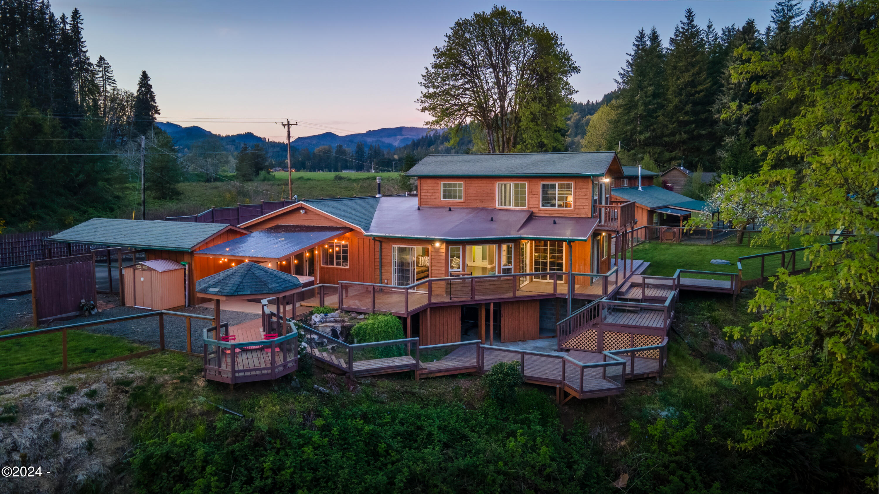 7006 Logsden Road Siletz, OR 97380 - Photo 5 of 74 Dusk Aerial 1
