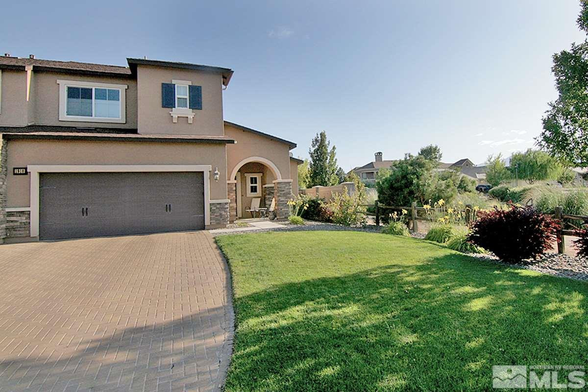 1910 Bears Ranch Drive Reno, NV 89521 - Photo 2 of 20 a front view of a house with a garden and plants