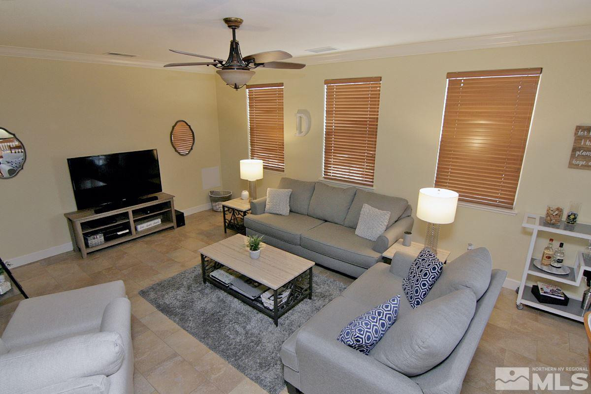 1910 Bears Ranch Drive Reno, NV 89521 - Photo 8 of 20 a living room with furniture a rug and a window