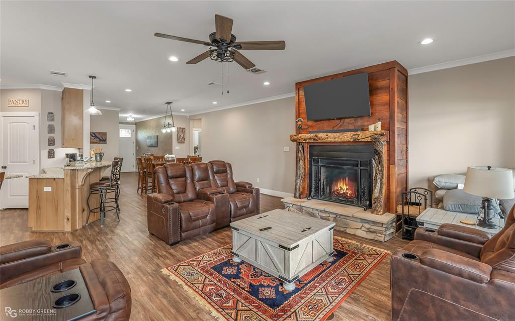 1072 Featherston Road Homer, LA 71040 - Photo 15 of 40 a living room with furniture and a fireplace