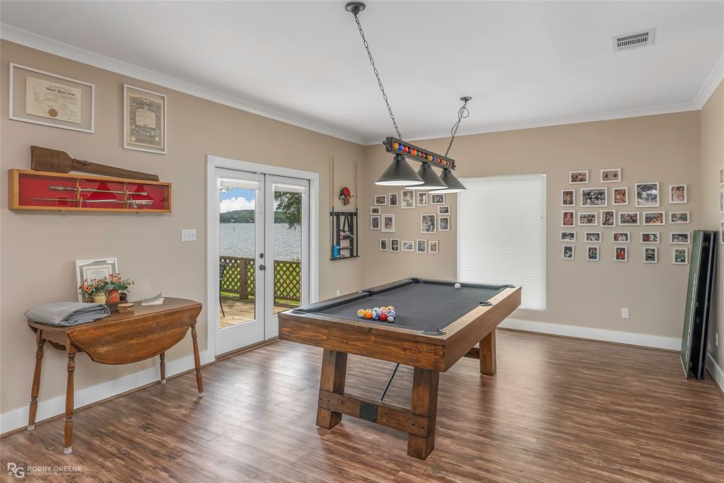 1072 Featherston Road Homer, LA 71040 - Photo 19 of 40 a living room with furniture and wooden floor