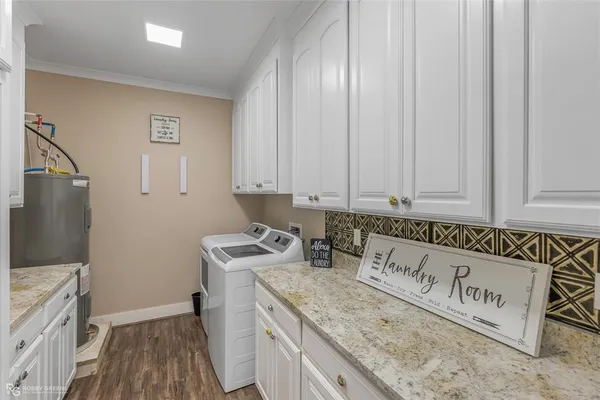 a kitchen with a sink a stove and a refrigerator