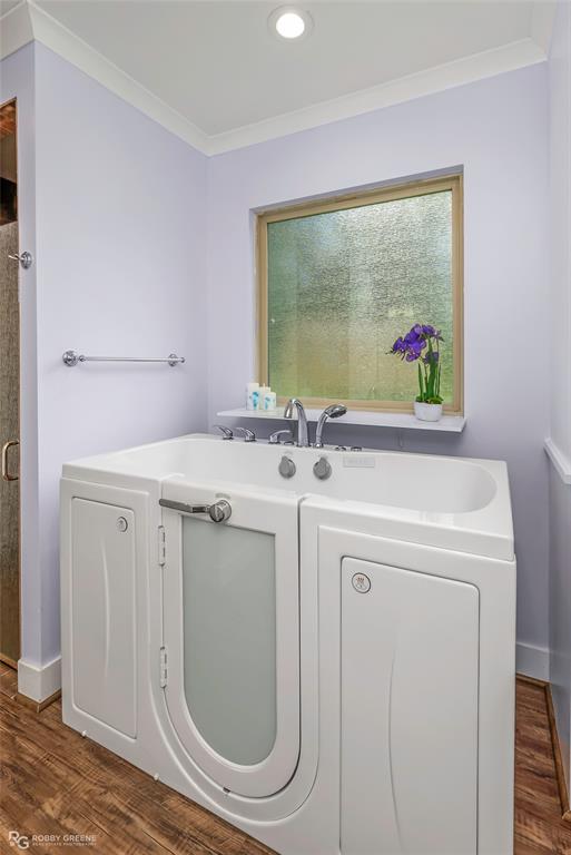 1072 Featherston Road Homer, LA 71040 - Photo 28 of 40 a bathroom with a sink a toilet and a mirror