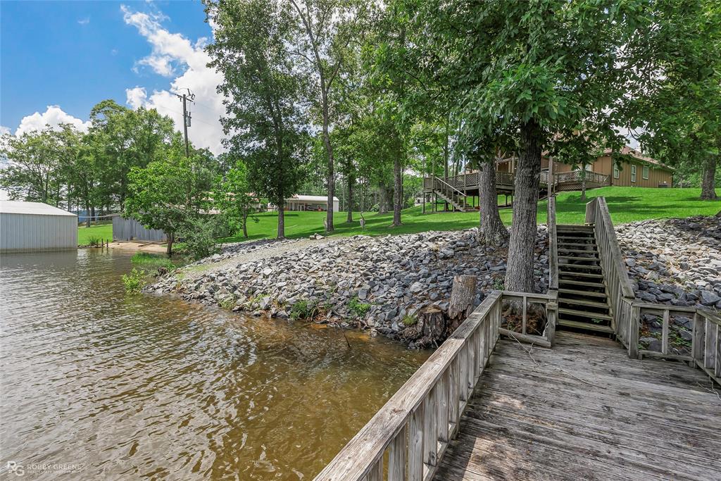 1072 Featherston Road Homer, LA 71040 - Photo 38 of 40 a view of a pathway with a wrought fence