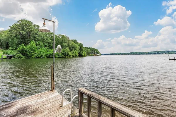 a view of a lake from a balcony