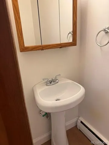 a white sink sitting next to a white sink