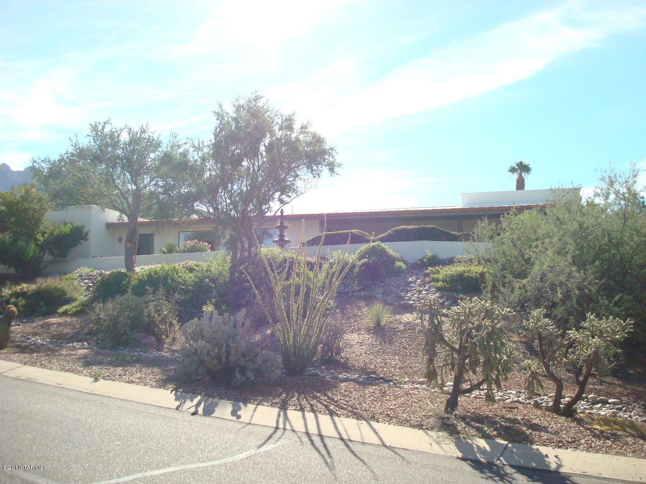 9985 North Desert Sky Road Oro Valley, AZ 85737 - Photo 2 of 43 a view of a yard