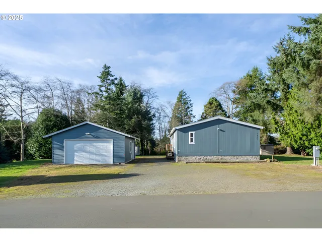 a house view with a garden space