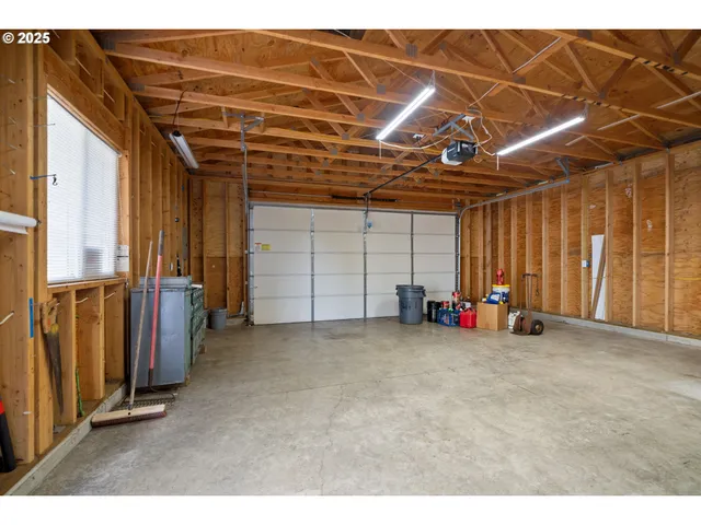 a view of a room with wooden walls