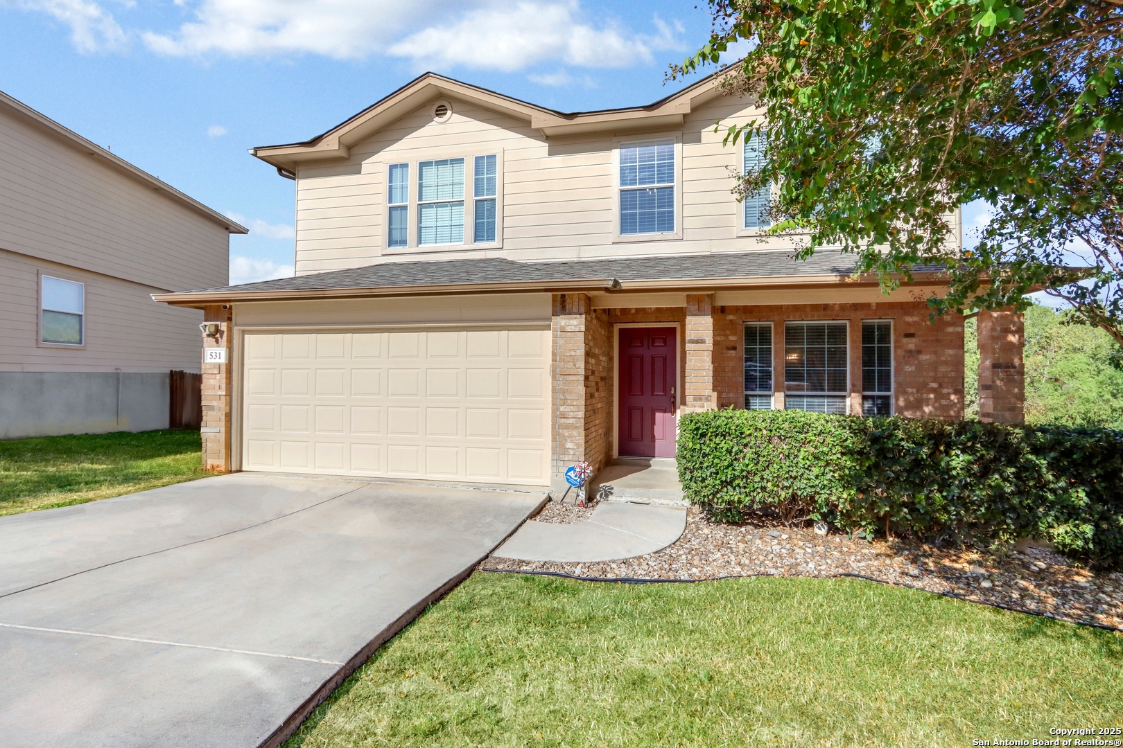 531 Erica Converse, TX 78109 - Photo 3 of 30 a view of a house with a yard and plants