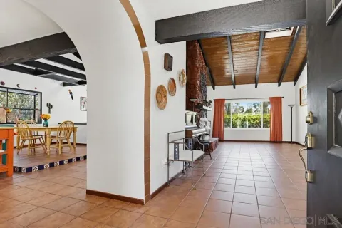 a view of an entryway with a lot of stuff