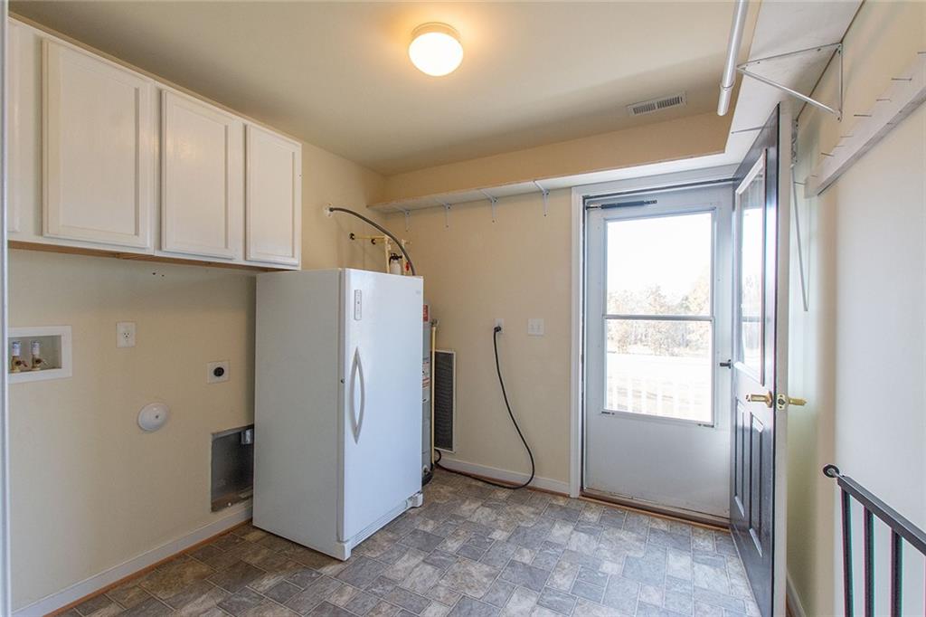 9481 Sturgeon Point Road Charles City, VA 23030 - Photo 12 of 44 a view of an empty room with a window