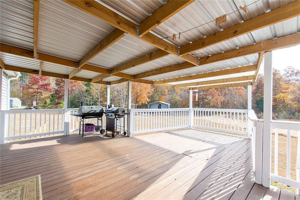 9481 Sturgeon Point Road Charles City, VA 23030 - Photo 16 of 44 a view of a balcony with wooden floor