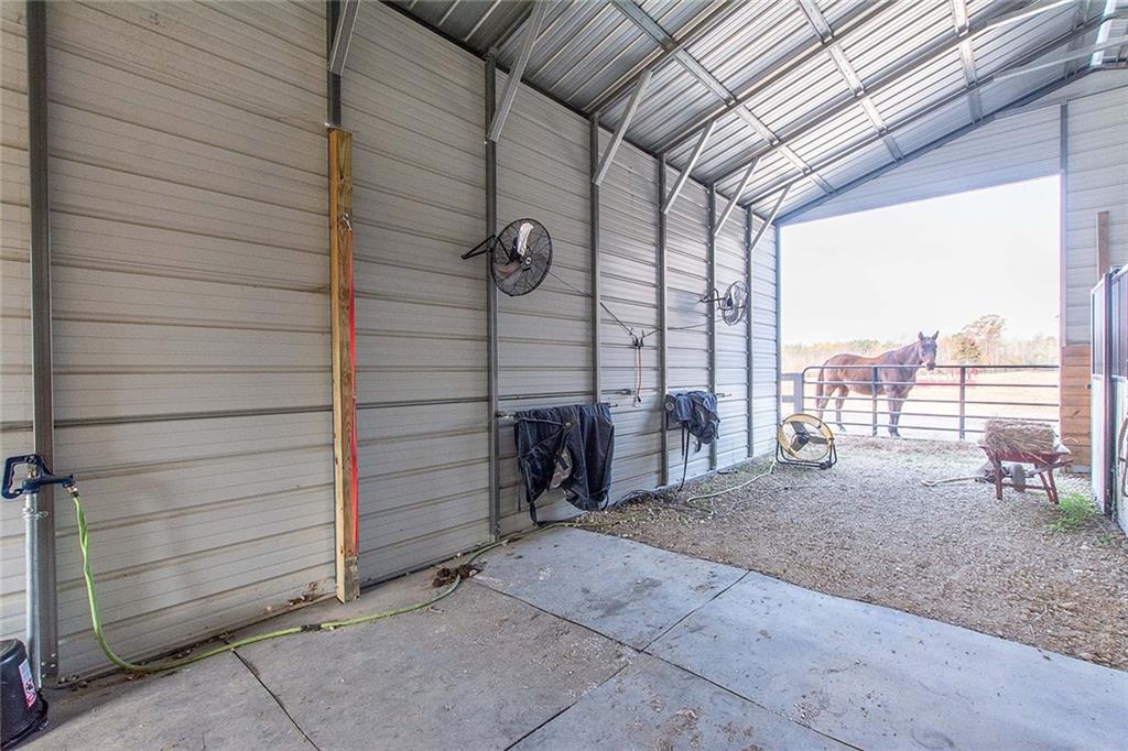 9481 Sturgeon Point Road Charles City, VA 23030 - Photo 21 of 44 a view of a room with a balcony and furniture