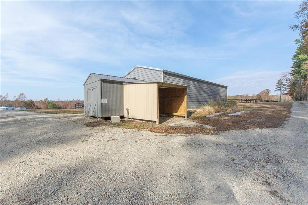 9481 Sturgeon Point Road Charles City, VA 23030 - Photo 26 of 44 a view of a dirt road and road