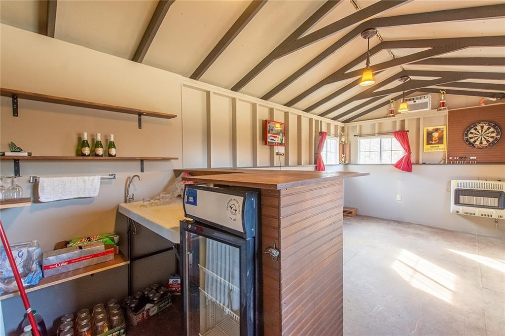 9481 Sturgeon Point Road Charles City, VA 23030 - Photo 33 of 44 a utility room with washer and dryer