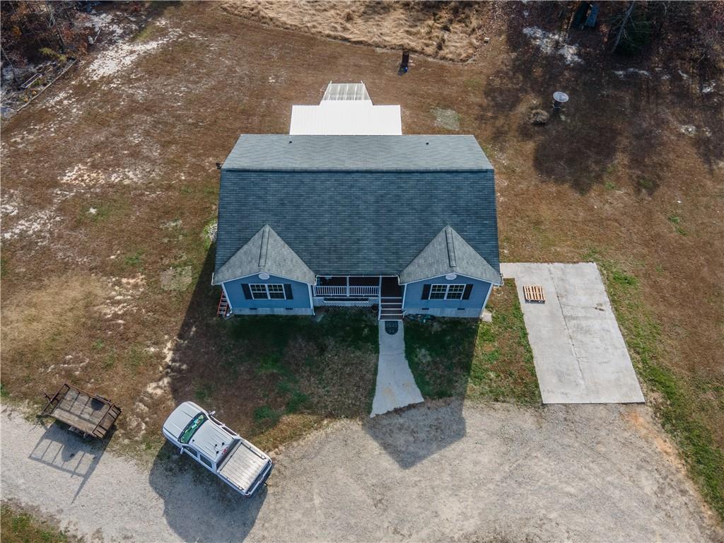 9481 Sturgeon Point Road Charles City, VA 23030 - Photo 42 of 44 an aerial view of a house with pool patio and fire pit