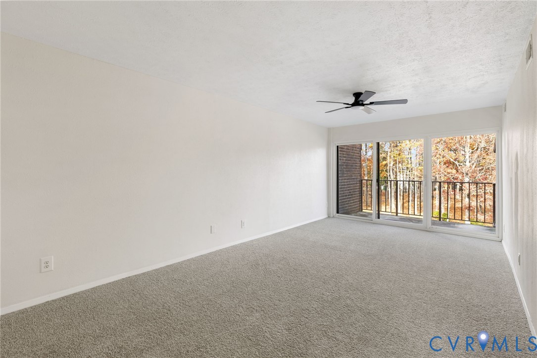 1501 Largo Road, Unit 301 Henrico, VA 23238 - Photo 7 of 40 a view of an empty room with a window