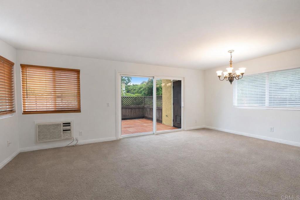 1145 Helix Street, Unit 13 Spring Valley, CA 91977 - Photo 7 of 12 a view of an empty room with a window