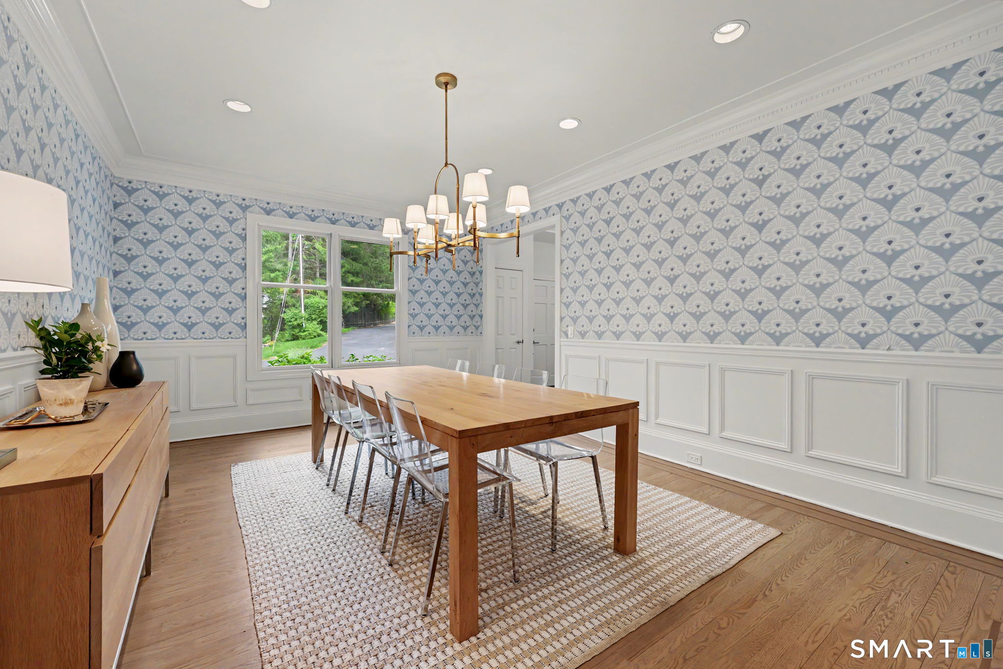 10 Side Hill Road Westport, CT 06880 - Photo 5 of 40 a view of a dining room with furniture and wooden floor