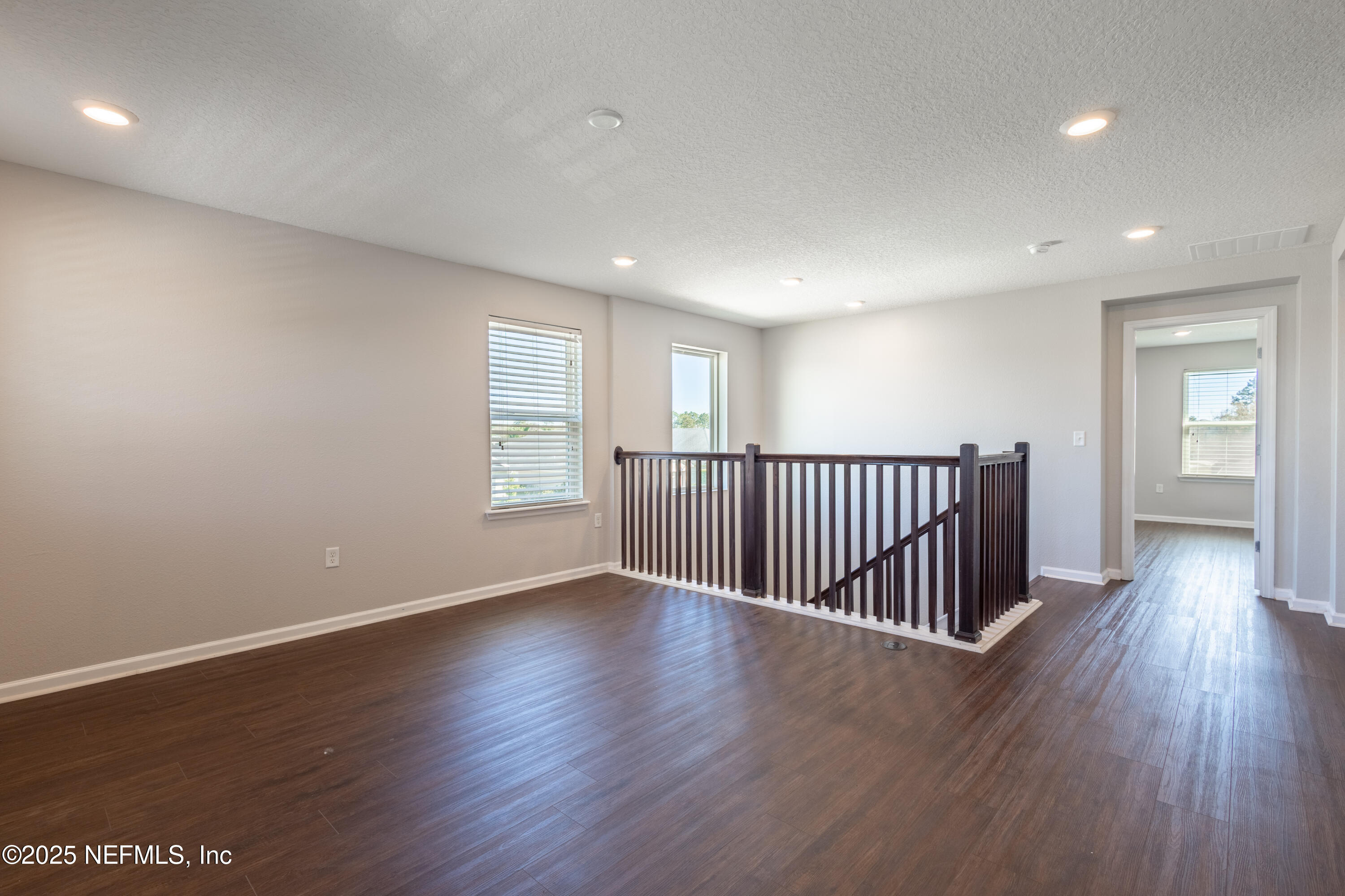 68 Redland Way Jacksonville, FL 32218 - Photo 22 of 40 a view of a room with wooden floor and windows