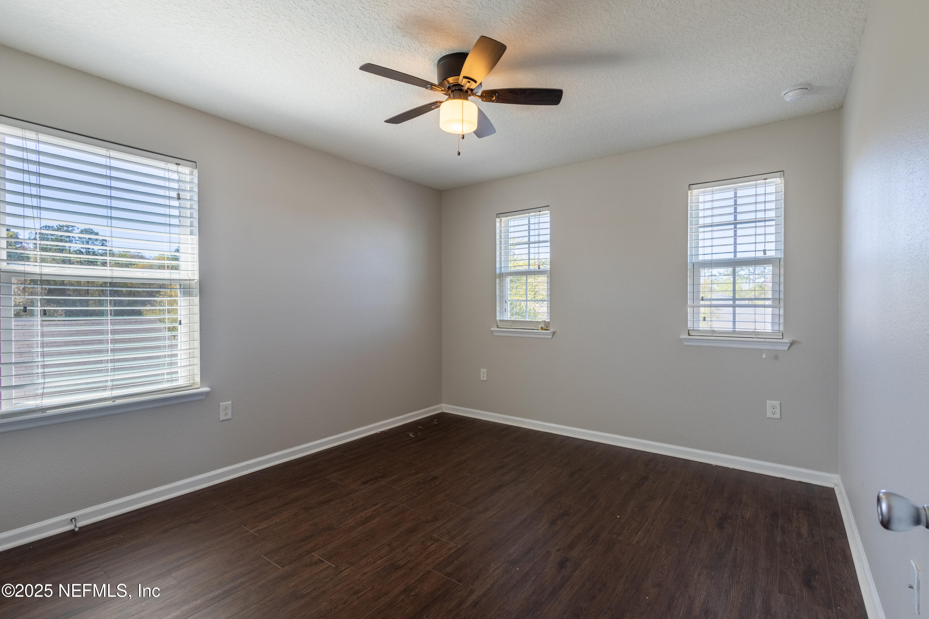 68 Redland Way Jacksonville, FL 32218 - Photo 26 of 40 a view of a room with wooden floor and windows