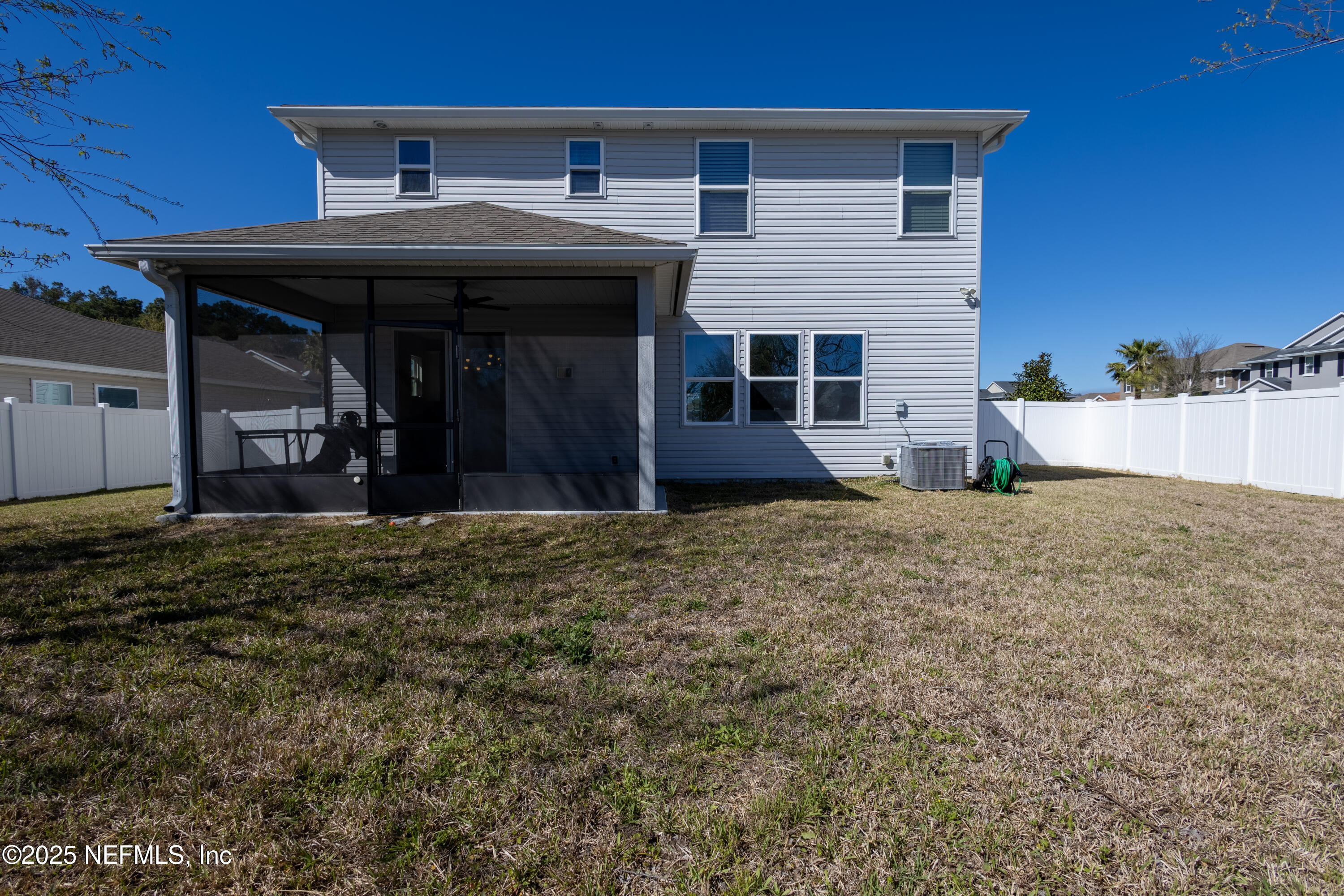 68 Redland Way Jacksonville, FL 32218 - Photo 38 of 40 a front view of a house with a garden