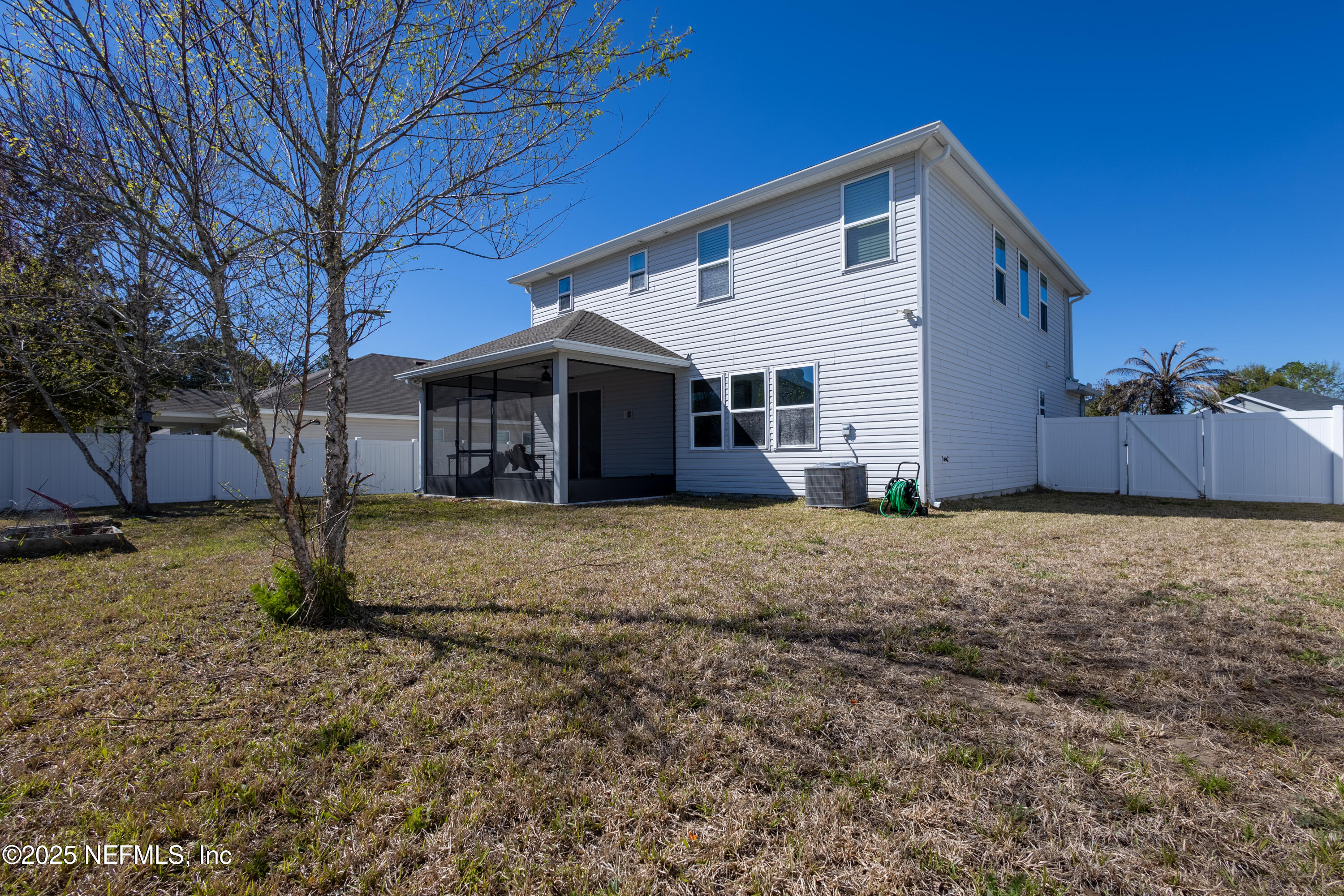 68 Redland Way Jacksonville, FL 32218 - Photo 39 of 40 a view of a house with a yard