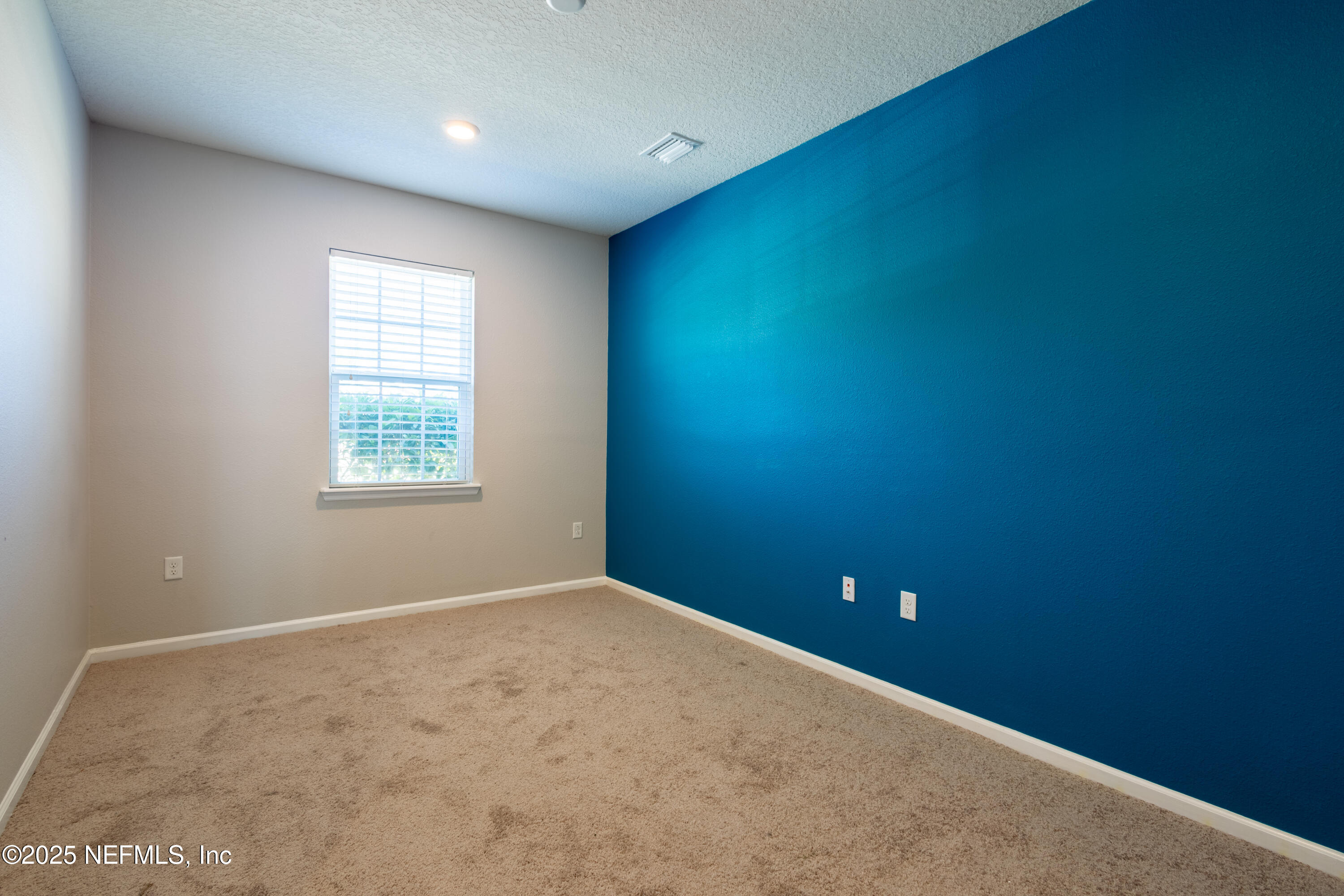68 Redland Way Jacksonville, FL 32218 - Photo 6 of 40 an empty room with windows