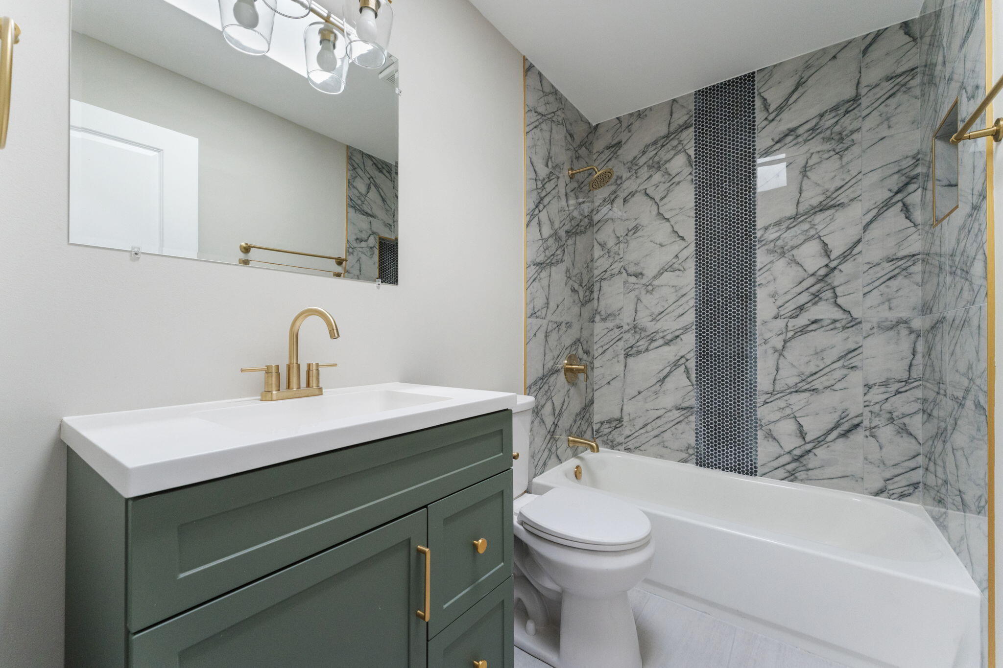 2624 Fossil Stone Road Dyer, IN 46311 - Photo 18 of 30 a bathroom with a sink a toilet and shower