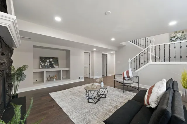 a living room with furniture and a table