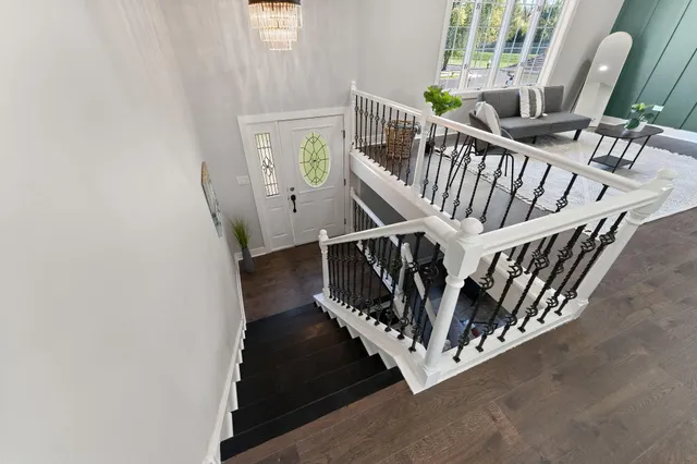 a view of entryway with wooden floor