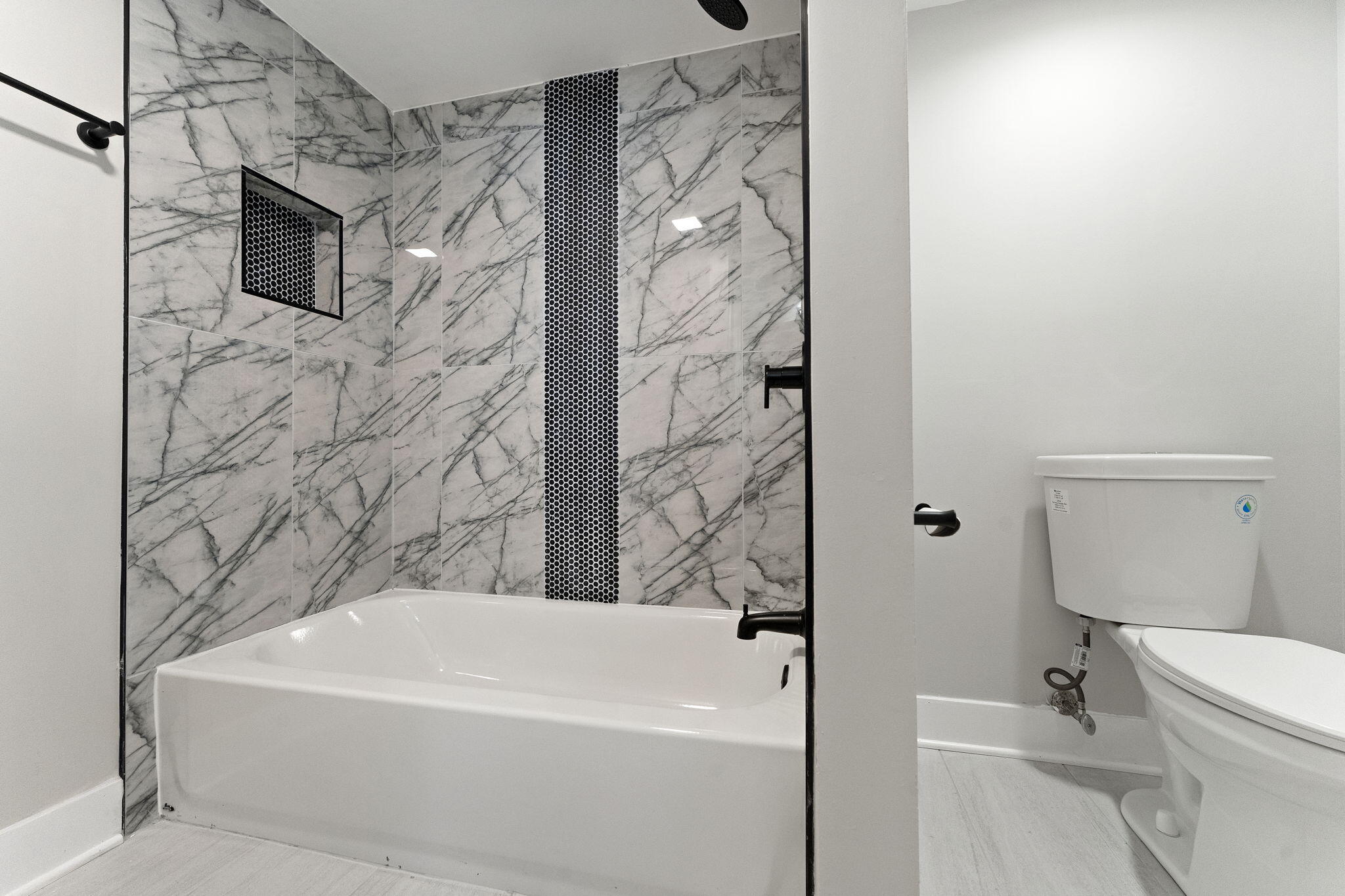 2624 Fossil Stone Road Dyer, IN 46311 - Photo 26 of 30 a white bath tub sitting next to a white toilet