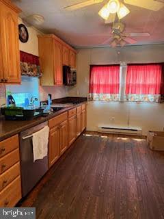 7361 Chesapeake Road Baltimore, MD 21220 - Photo 8 of 21 a kitchen with wooden floors and a sink