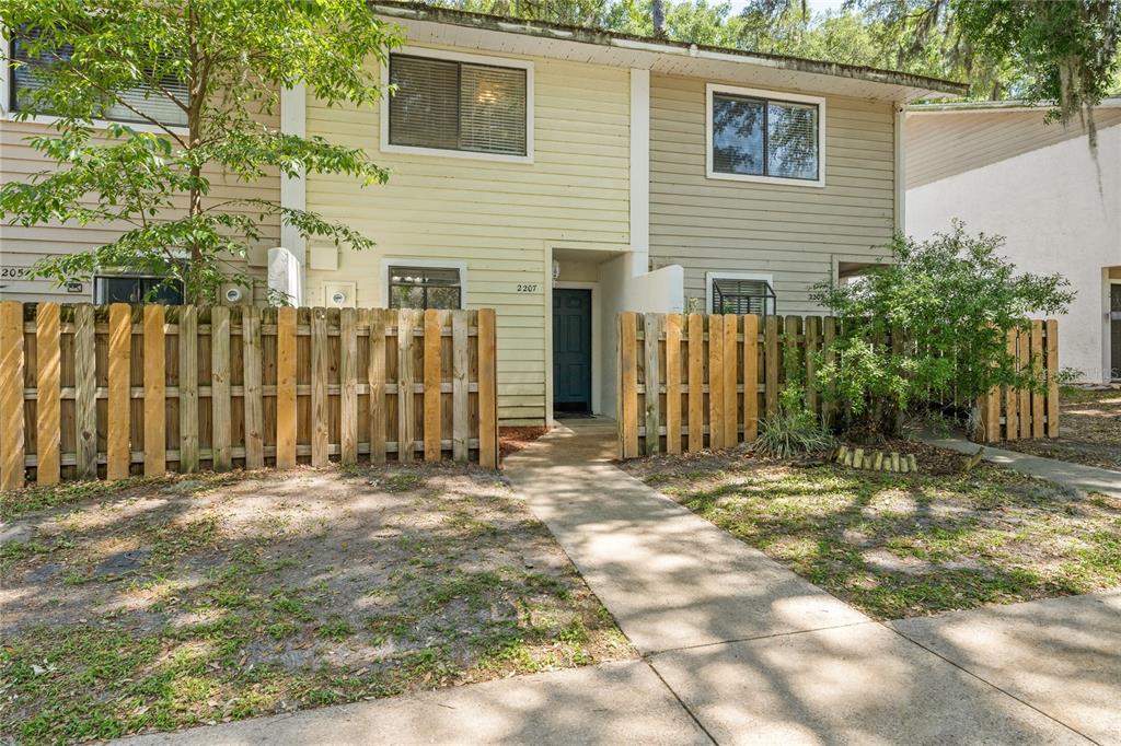 2207 Southwest 39 Way Gainesville, FL 32607 - Photo 1 of 1 a backyard of a house